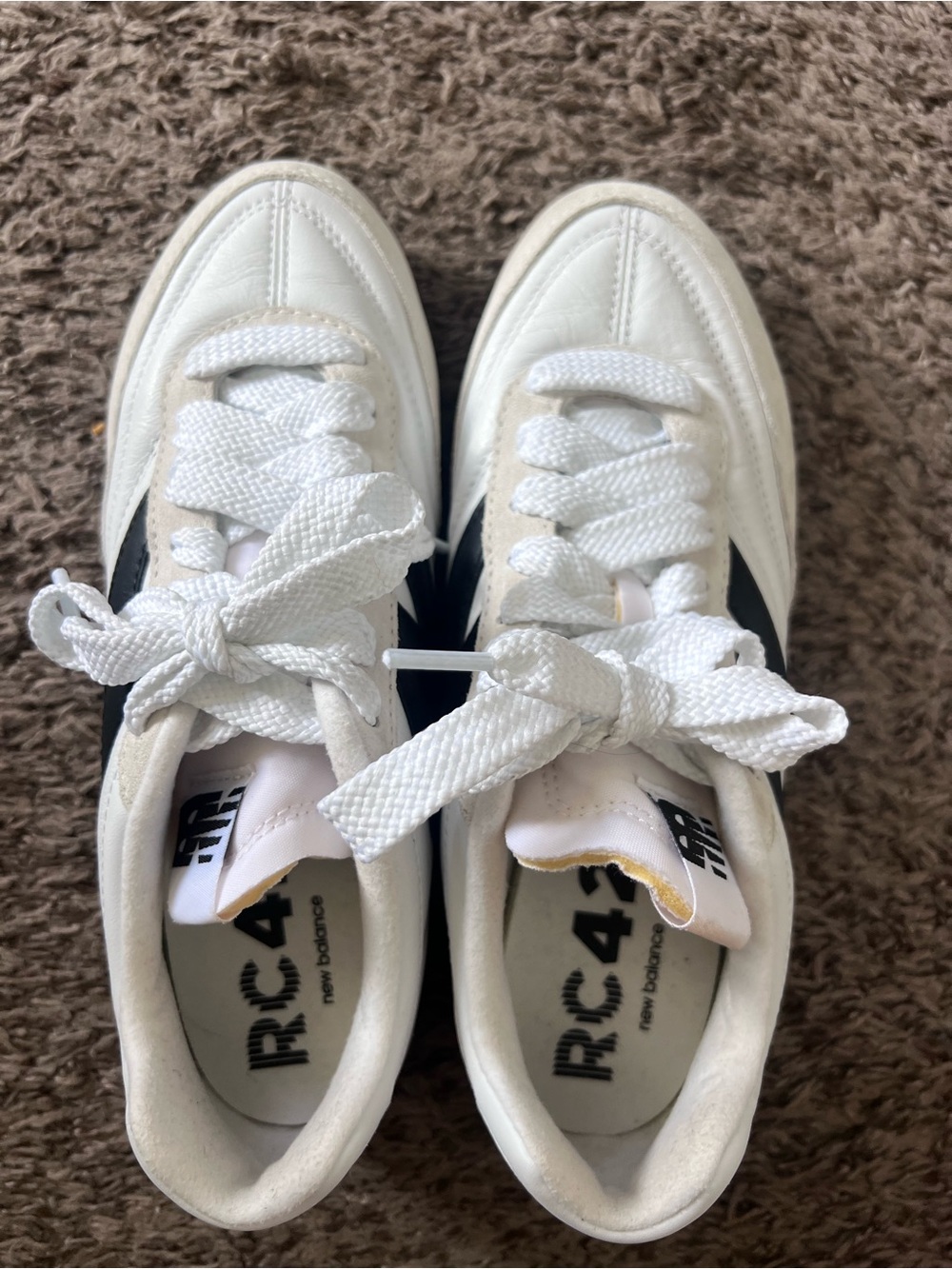New Balance White and Black Sneakers